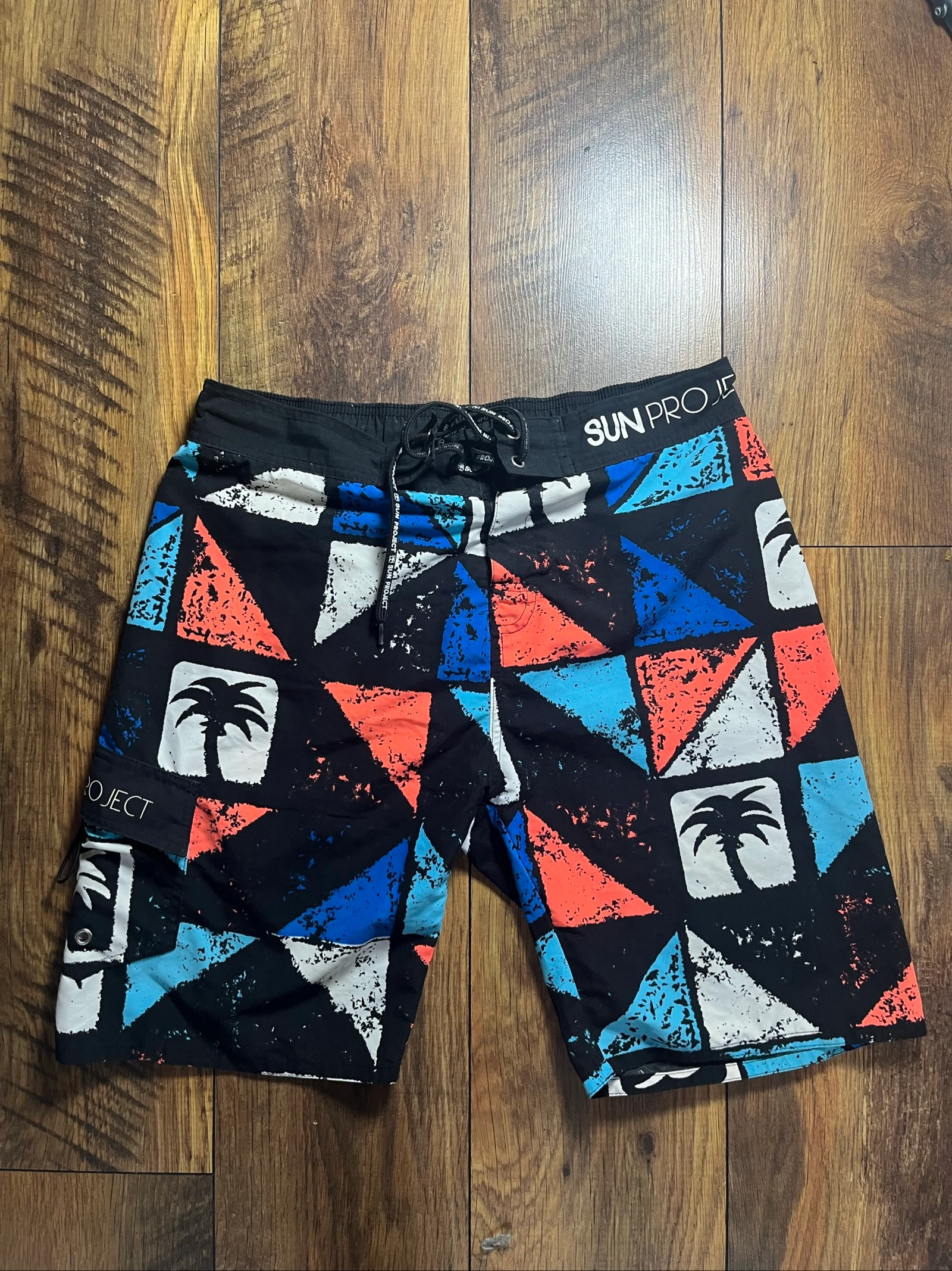 Boardshort noir imprimé triangles géométriques palmier - Sun Project - Taille M - très bon état